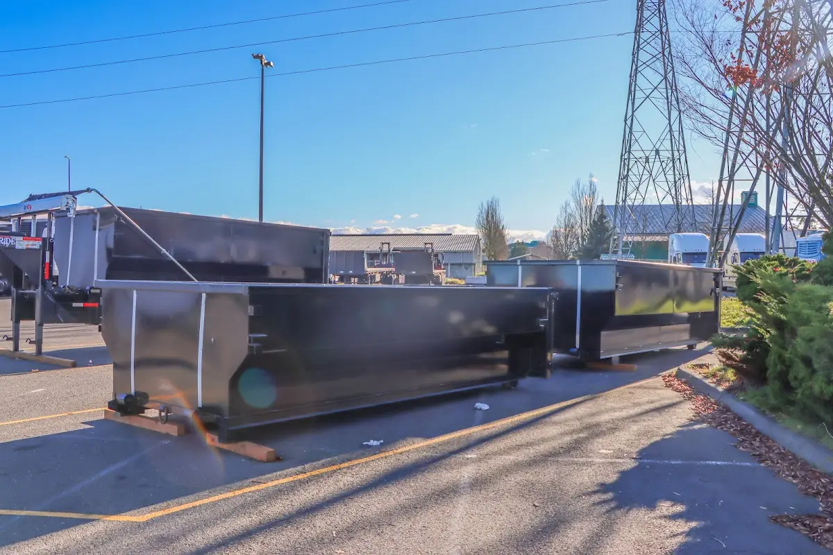 Roll-off dumpster ready for waste disposal at job site for Cleanout Dumpster Rental in Pound Ridge